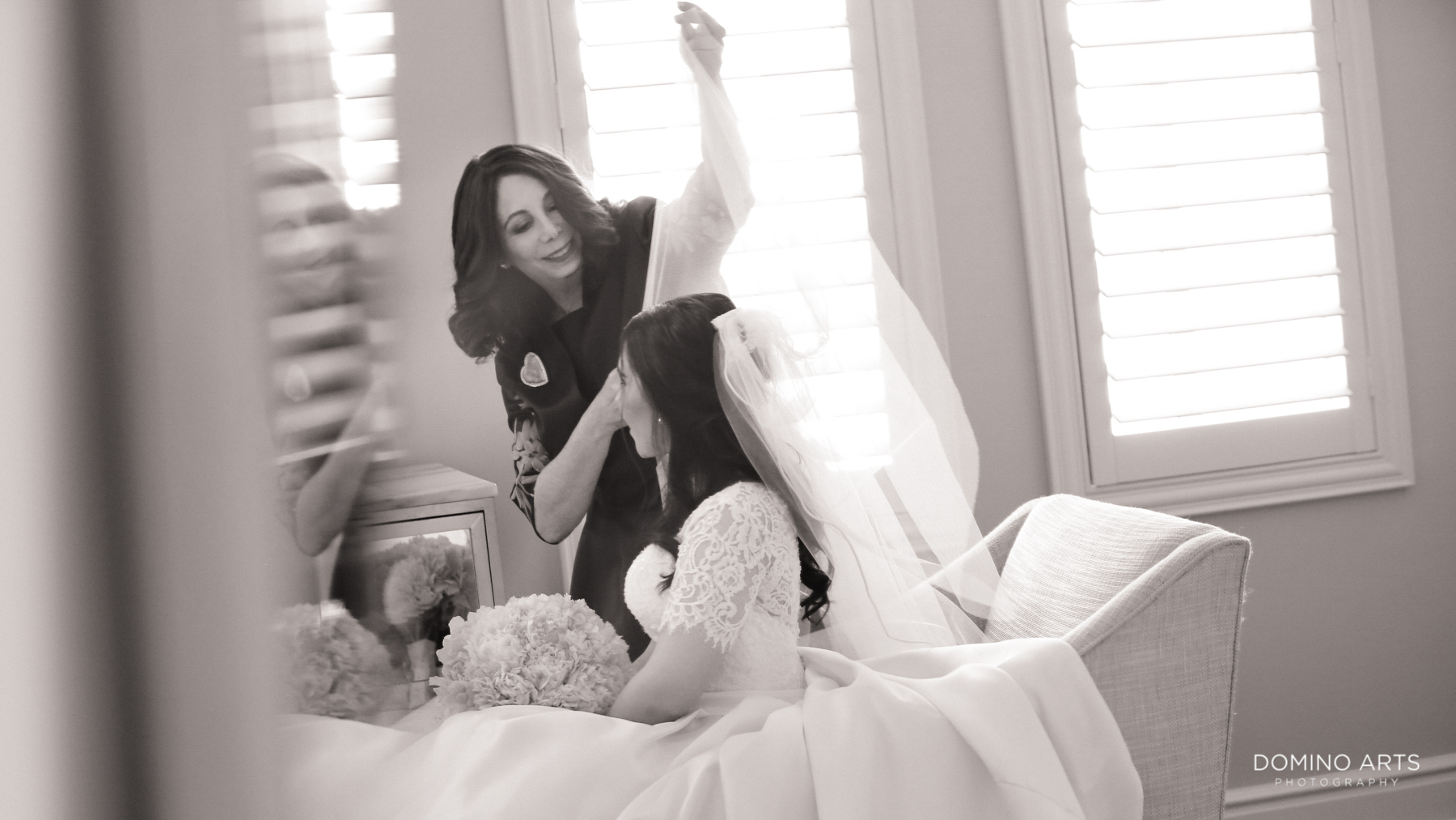 Mom and bride getting ready in Classic Luxury Wedding Photography at Turnberry Isle Miami