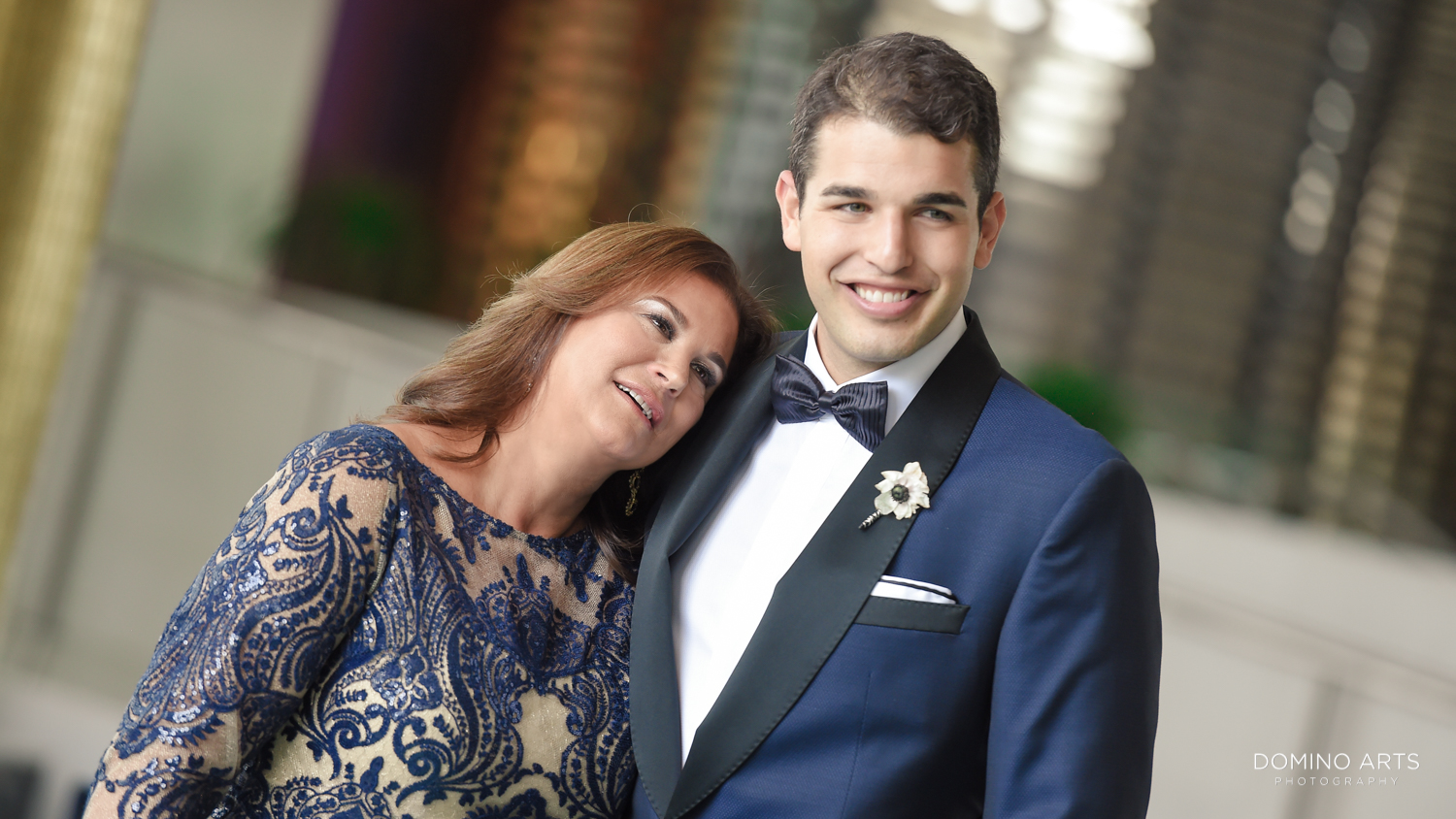 Groom with mom and family pictures at fontainebleau miami