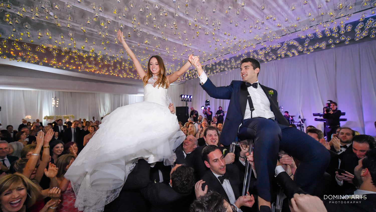 Fun hora at jewish wedding party pictures at fontainebleau miami