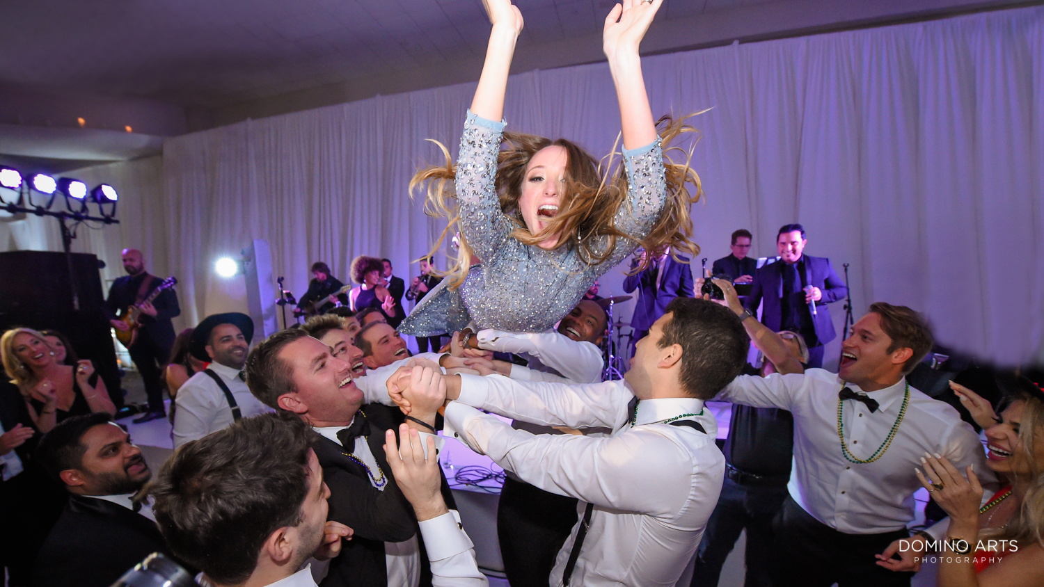 Fun crazy party pictures at fontainebleau miami wedding crowd surfing bride
