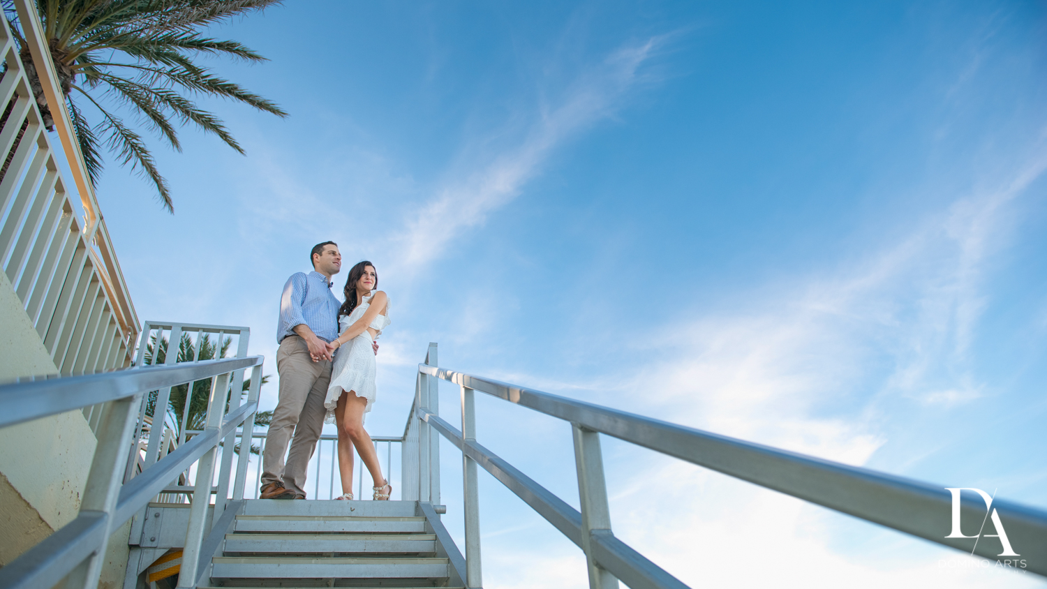 Beach-side Engagement Photography at Eau Palm Beach Resort & Spa by Domino Arts Photography