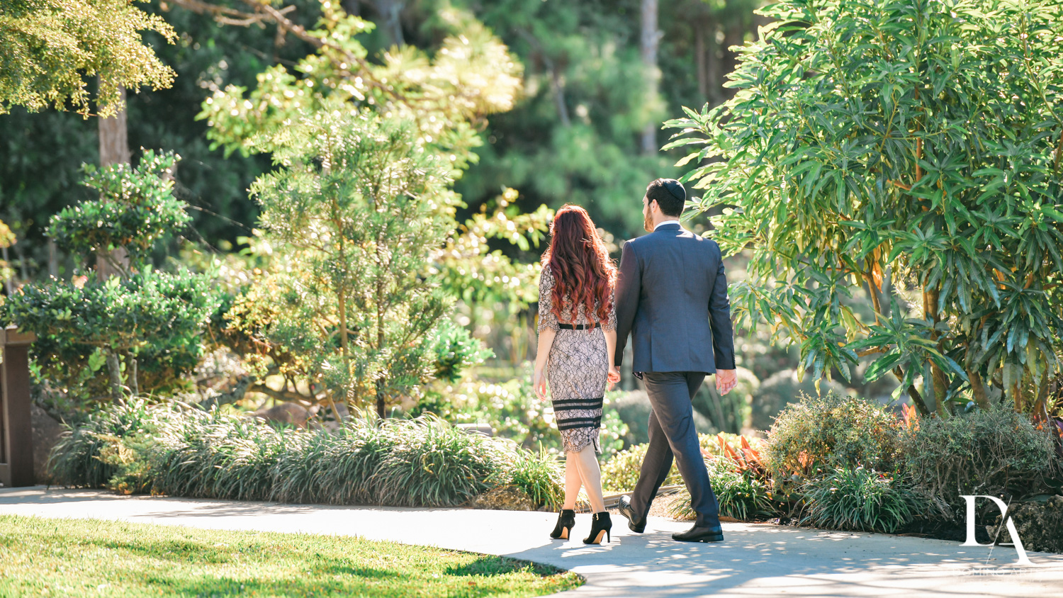 Holding hands at Japanese Garden Engagement at Morikami by Domino Arts Photography 