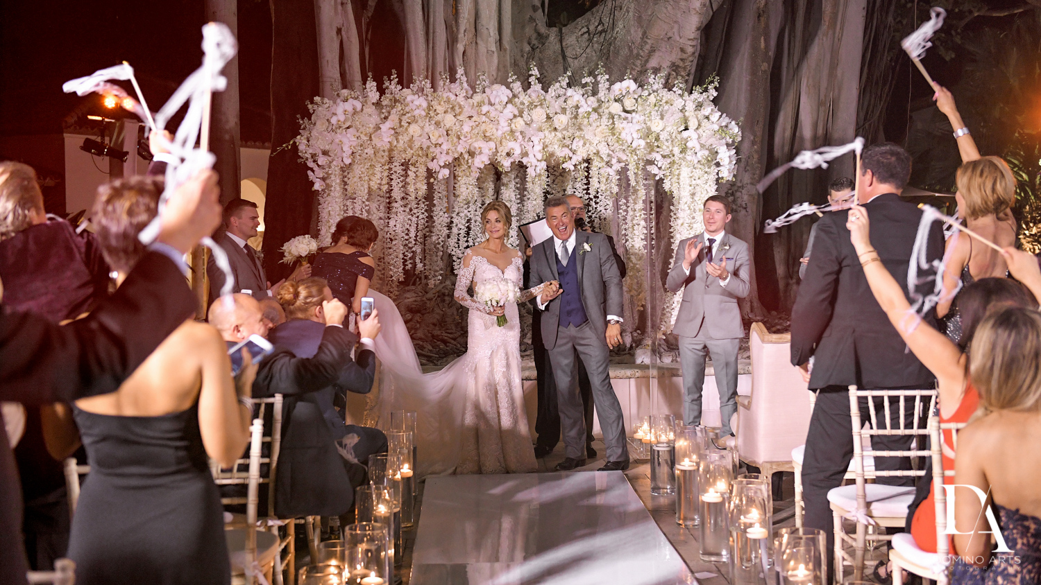 celebrating at Classic & Elegant Wedding Photography at Fisher Island Miami 