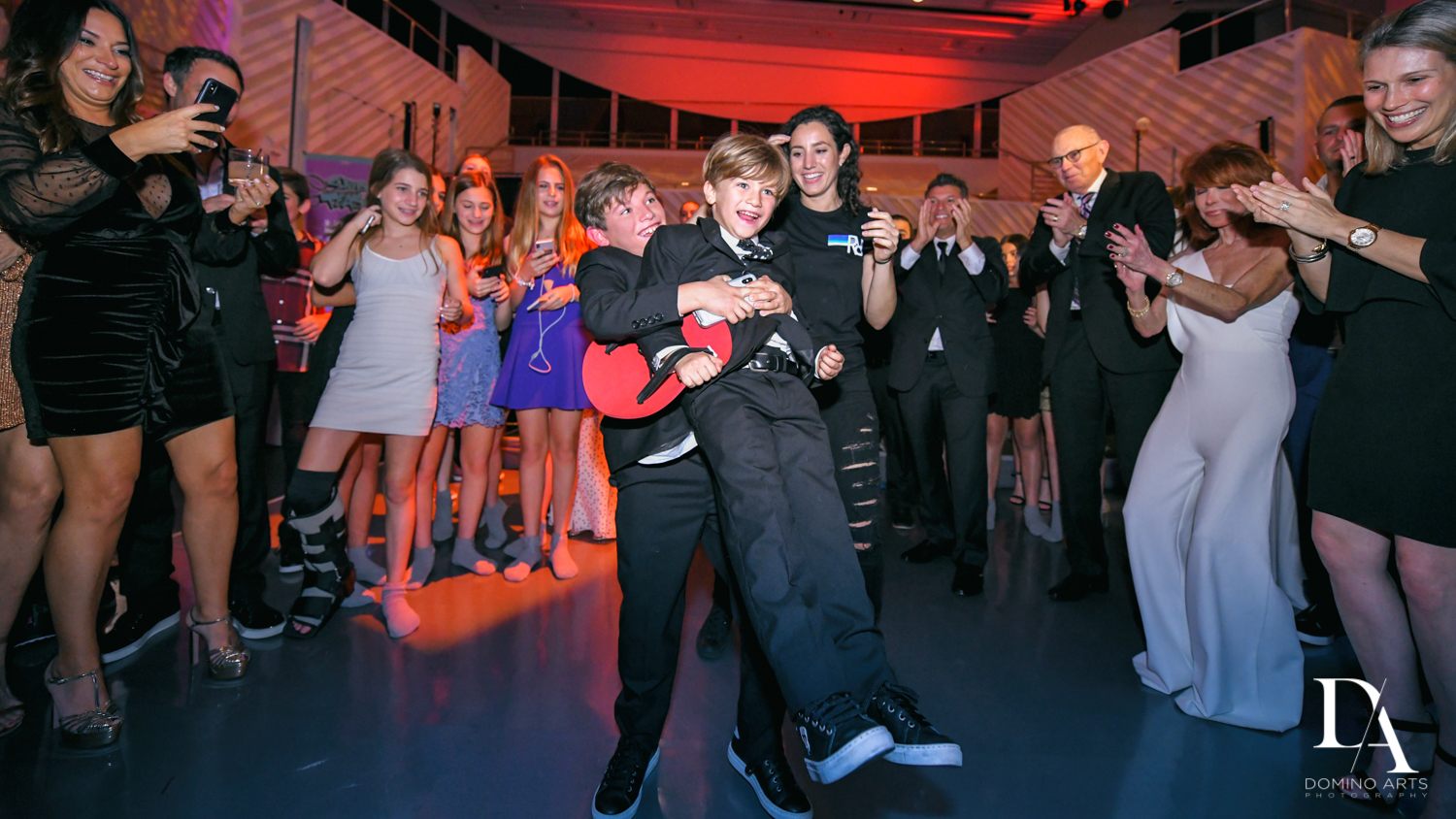 party pictures at Luxurious Broadway Theme Bat Mitzvah at New World Symphony in Miami Beach by Domino Arts Photography
