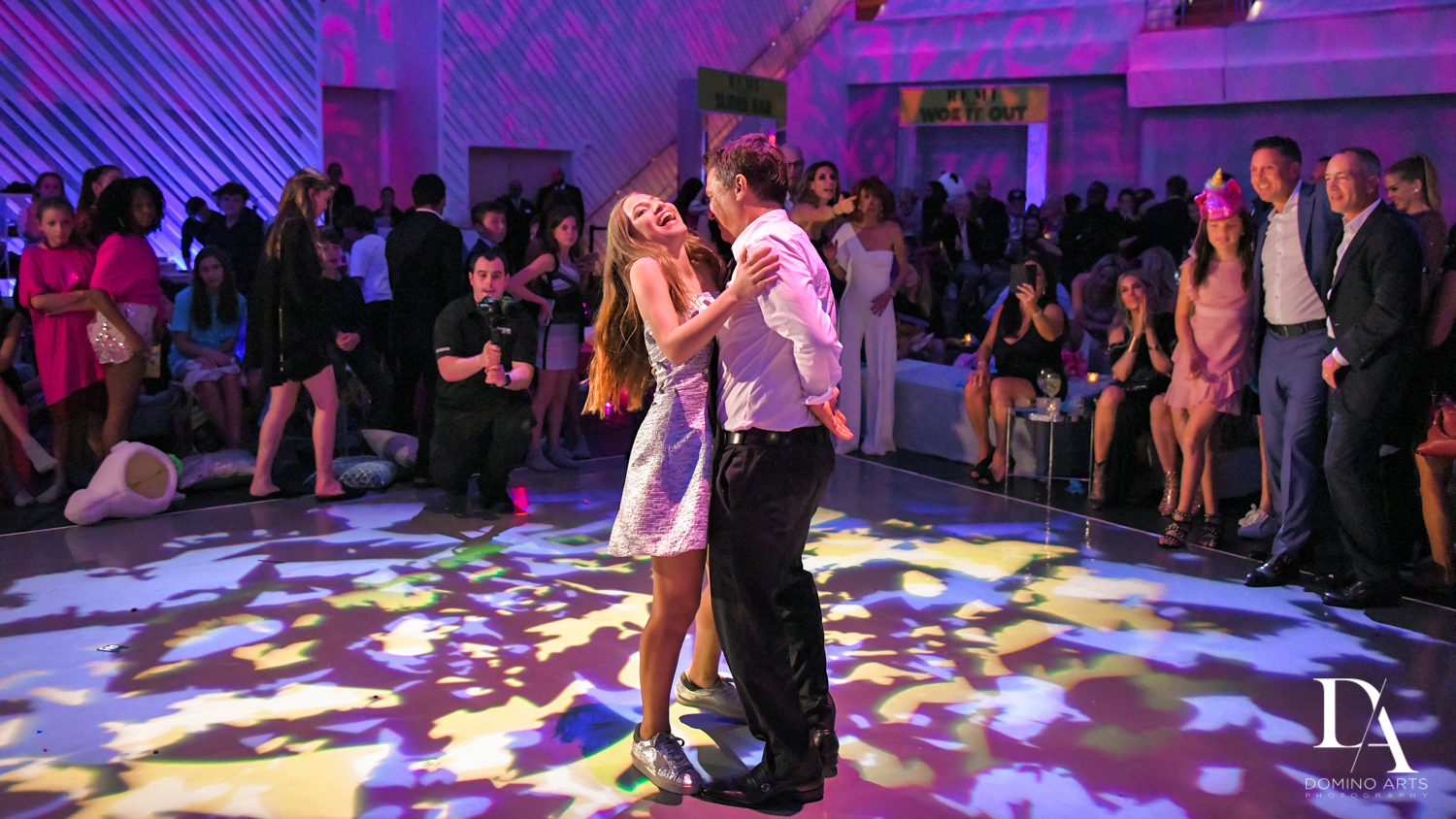 fun pictures at Luxurious Broadway Theme Bat Mitzvah at New World Symphony in Miami Beach by Domino Arts Photography