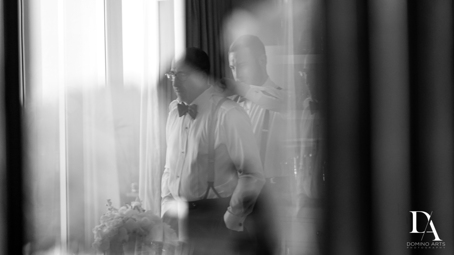 groom dressing at Tropical Garden Wedding at Fisher Island Miami by Domino Arts Photography