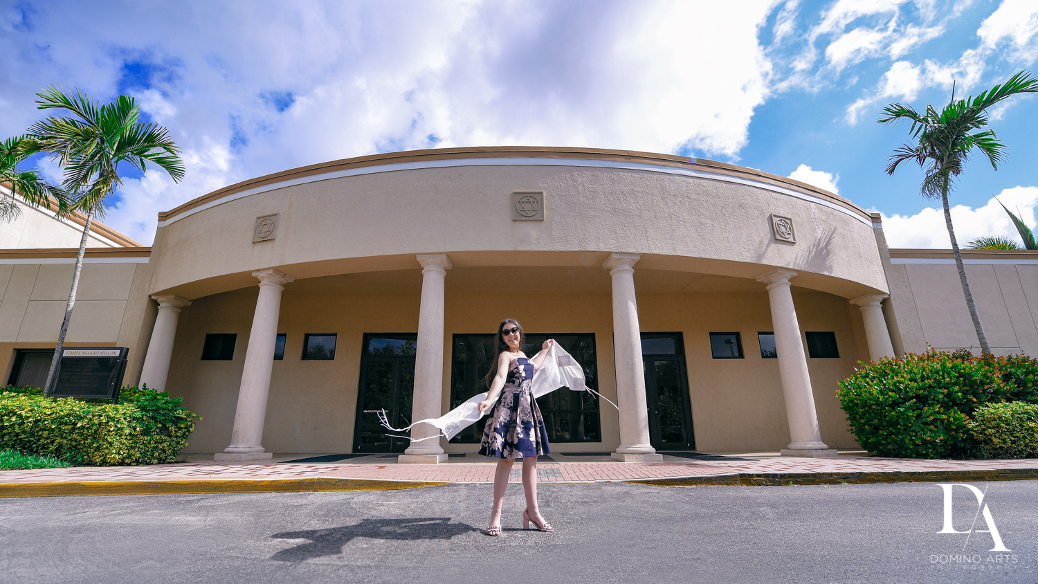 Girl outside of temple at New York Theme Bat Mitzvah at Woodfield Country Club, Boca Raton by Domino Arts Photography