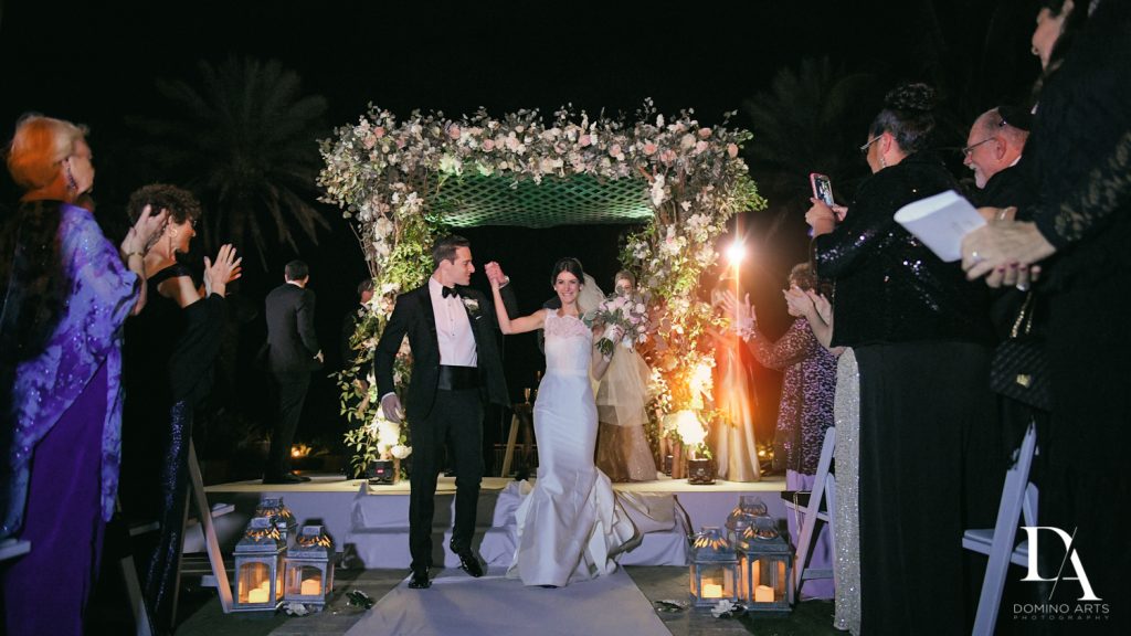 just married at Romantic Ocean Side Wedding at Eau Palm Beach by Domino Arts Photography