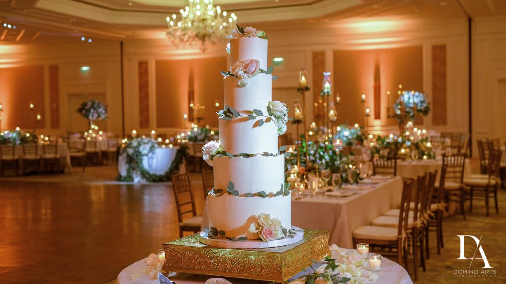 wedding cake at Romantic Ocean Side Wedding at Eau Palm Beach by Domino Arts Photography