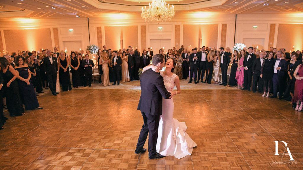 first dance at Romantic Ocean Side Wedding at Eau Palm Beach by Domino Arts Photography