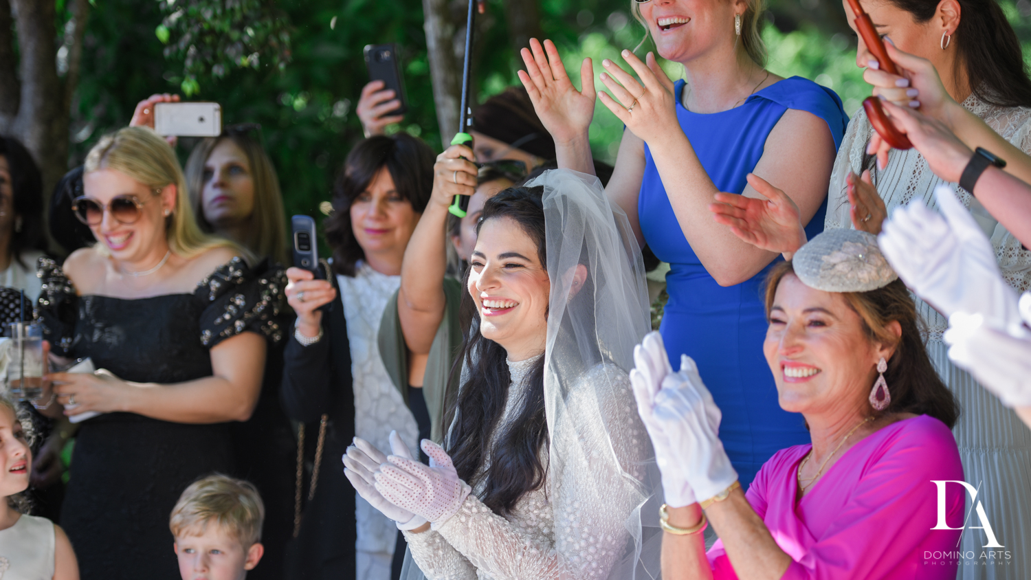 happy bride at Traditional Jewish Wedding at Deering Estate Miami by Domino Arts Photography