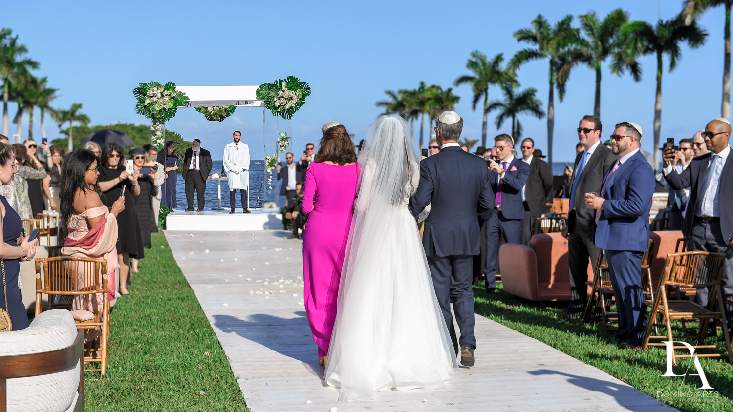 procession at Traditional Jewish Wedding at Deering Estate Miami by Domino Arts Photography