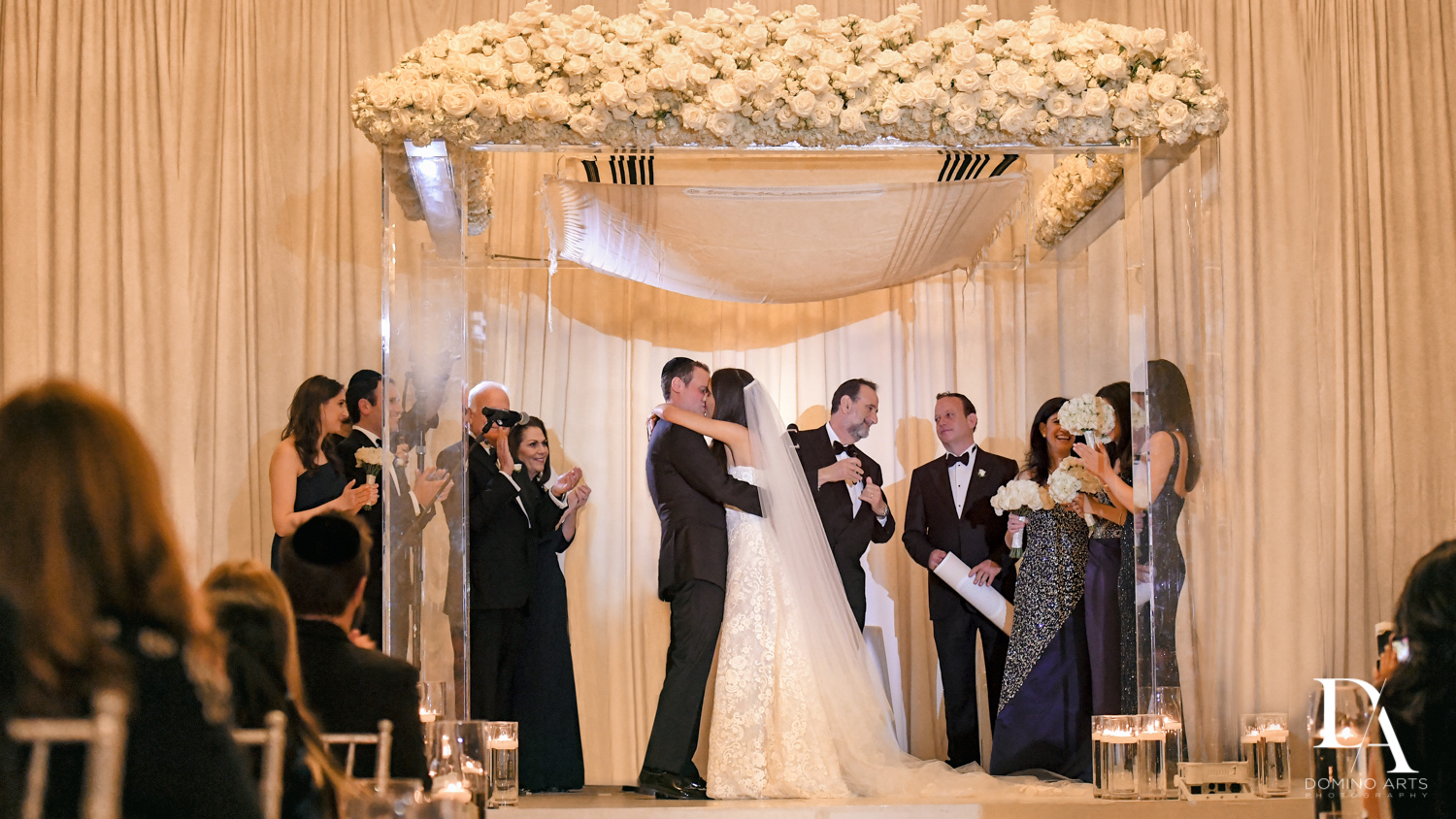 wedding kiss at A Ritz Carlton Wedding in Key Biscayne by Domino Arts Photography